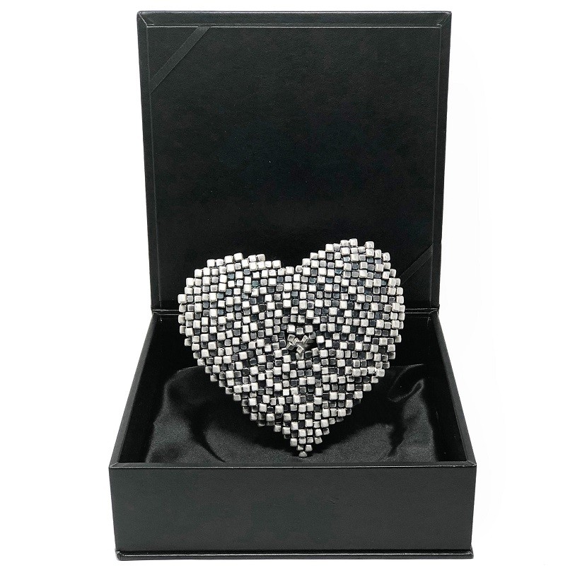 Heart of nails with ring