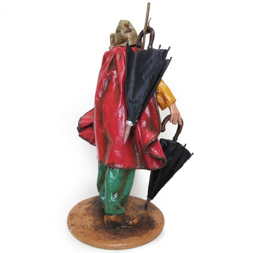 Man with umbrellas