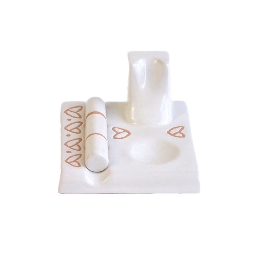 Ceramic pipe rest